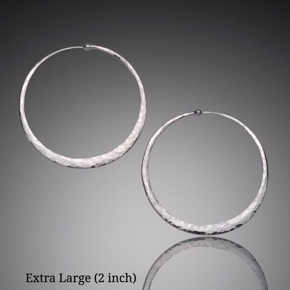 Statement-making 2 inch hammered sterling silver hoops with elegant endless closure design - Mostly Sweet's largest size